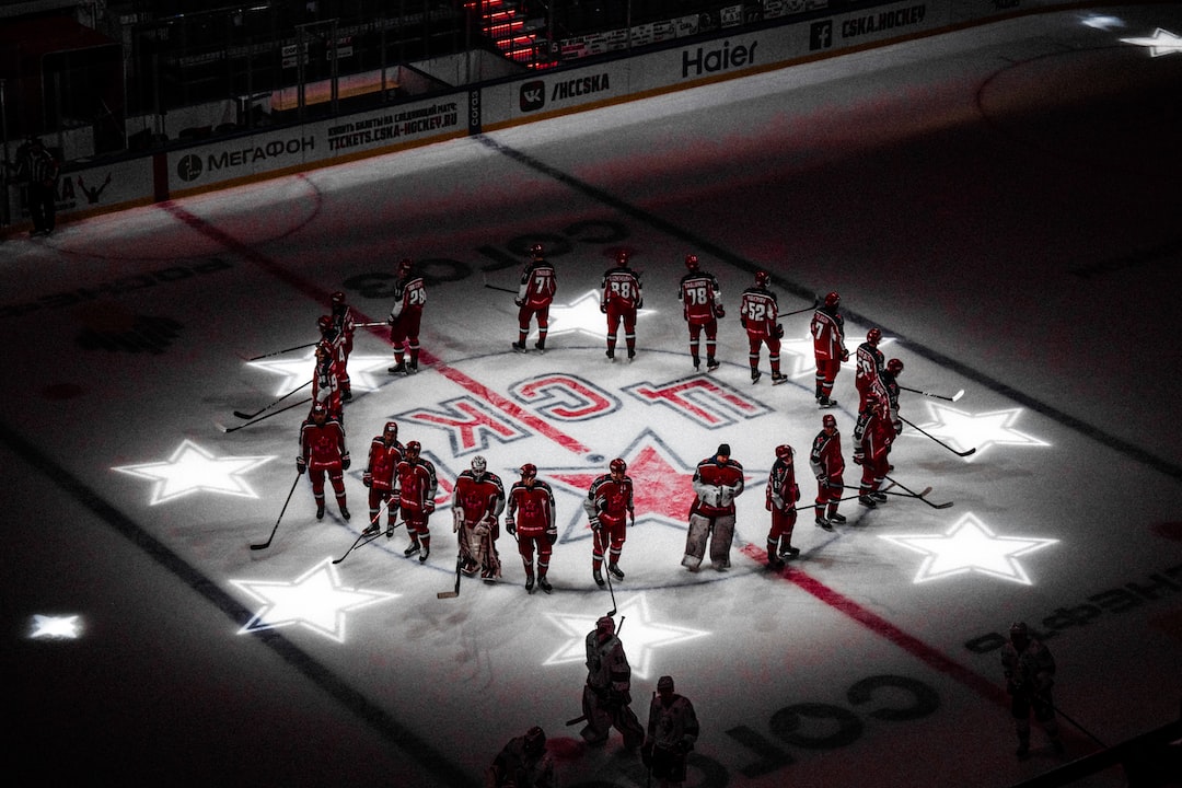 people playing ice hockey game